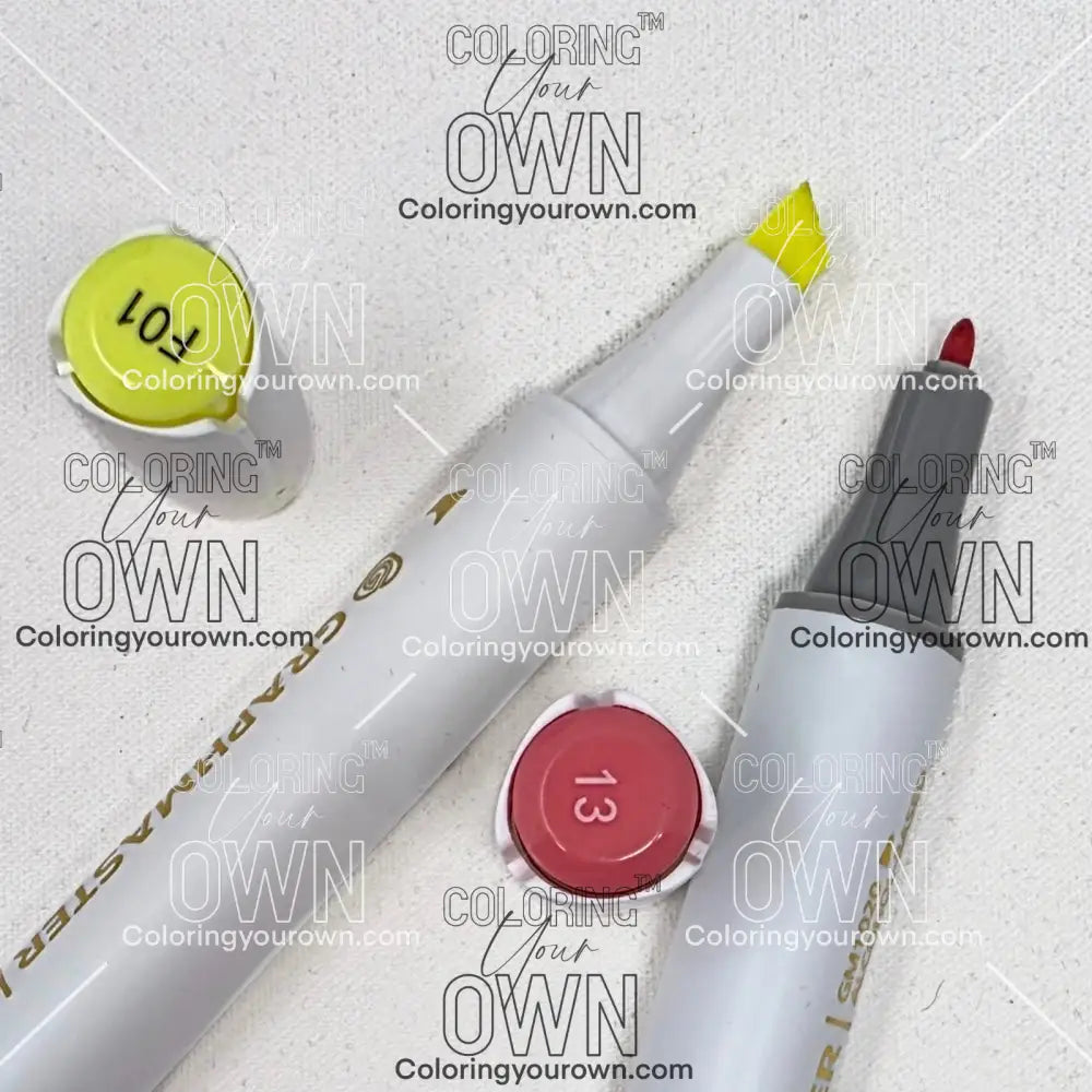 Two markers with different colored caps on a textured white surface
