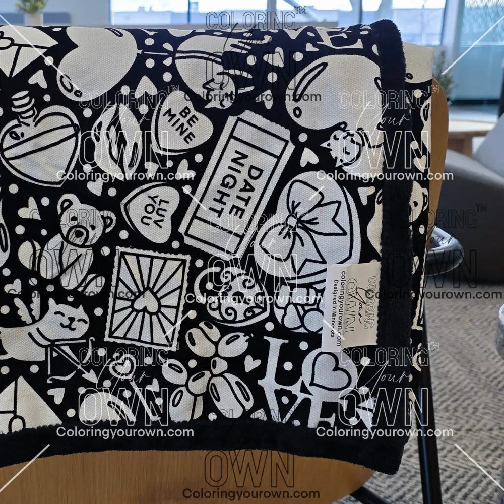 Color Your Own Blanket Valentines day blanket draped over a chair not colored, close up