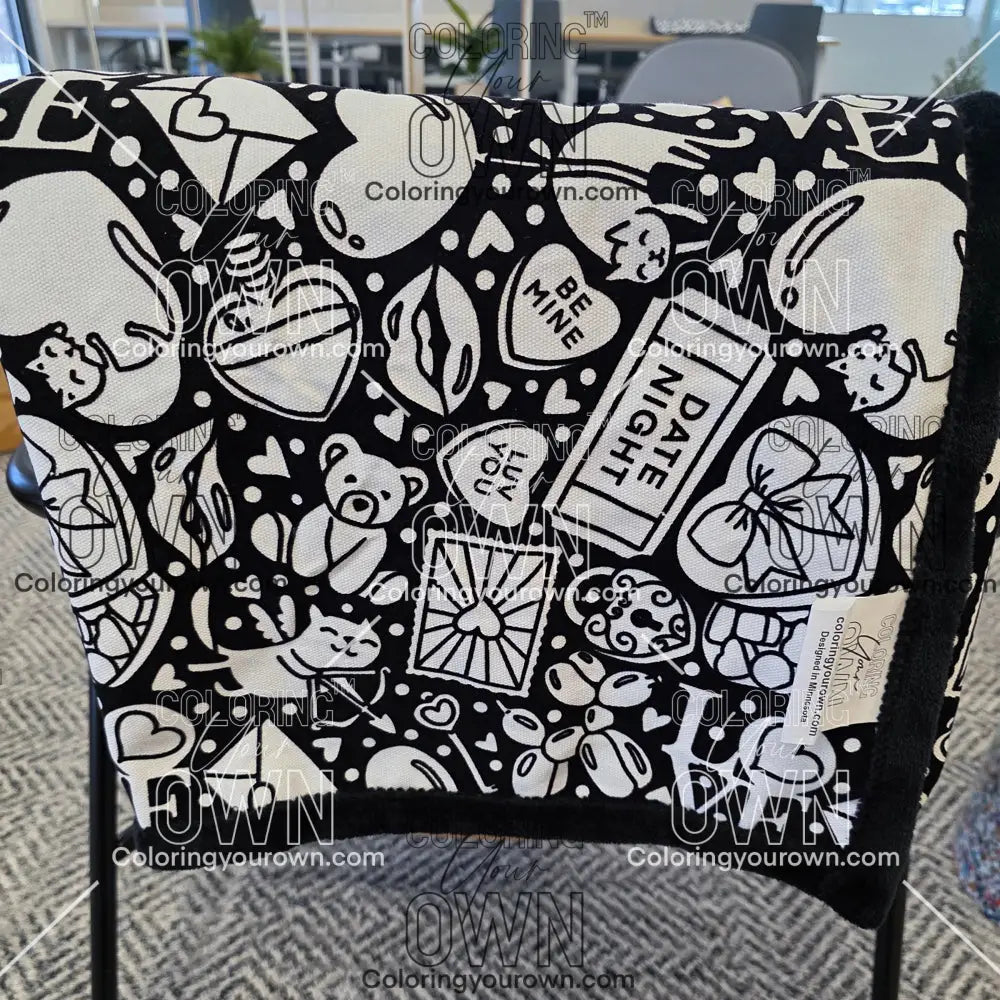 Color Your Own Blanket Valentines day blanket draped over a chair not colored, close up