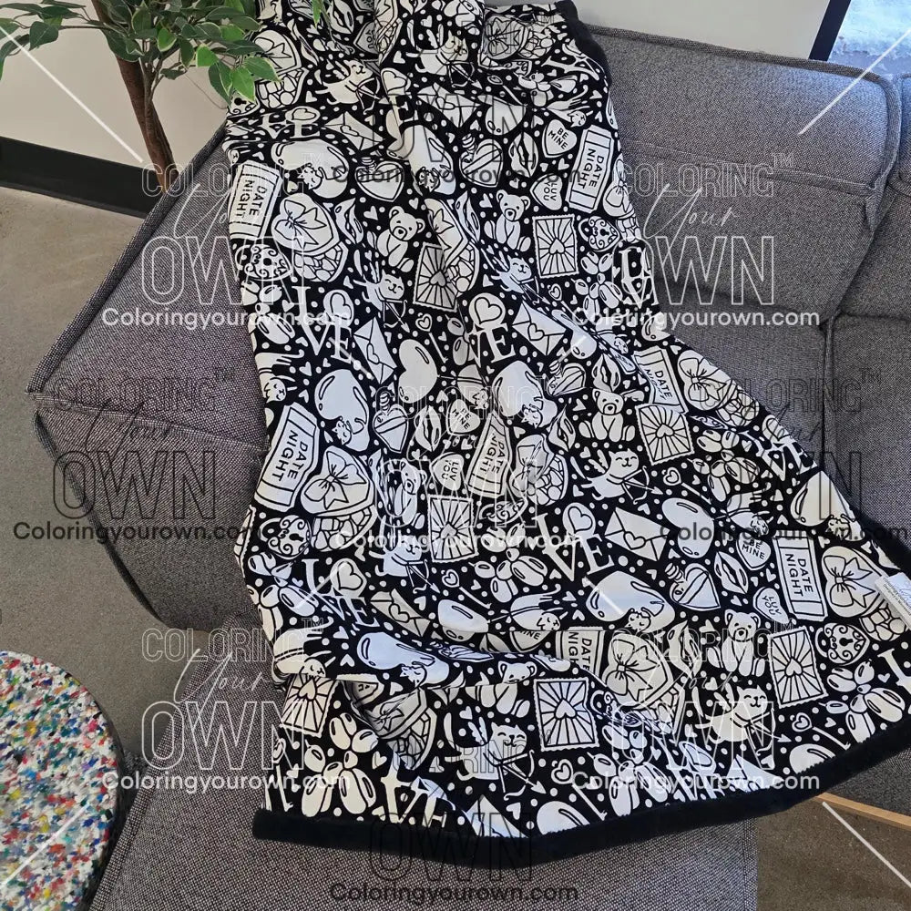 Color Your Own Blanket Valentines day blanket draped over a couch not colored