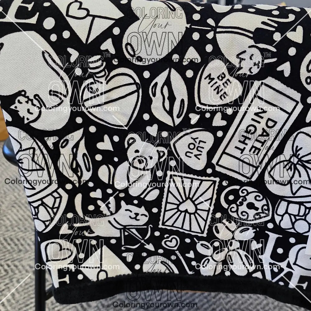 Color Your Own Blanket Valentines day blanket draped over a chair not colored, close up