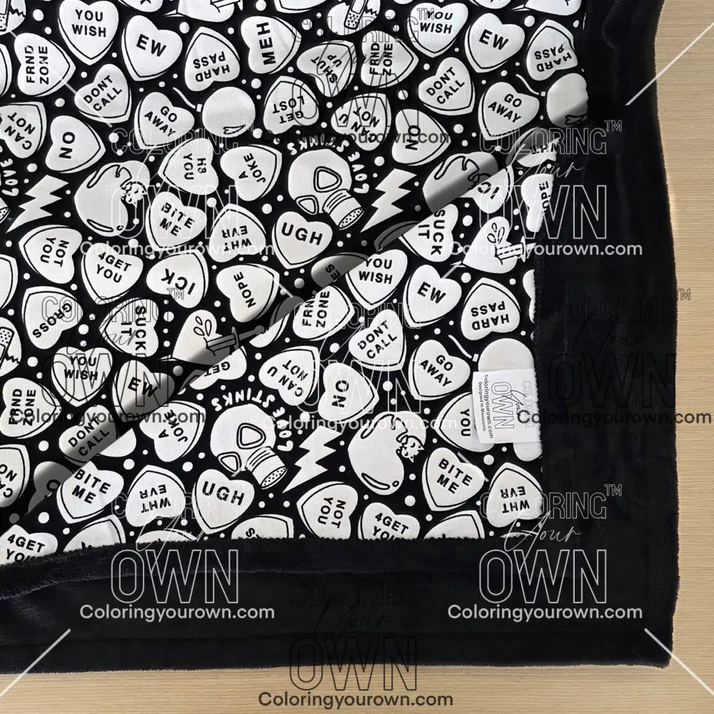 Color Your Own Blanket Anti-Valentines day blanket layed out on a table not colored, close up