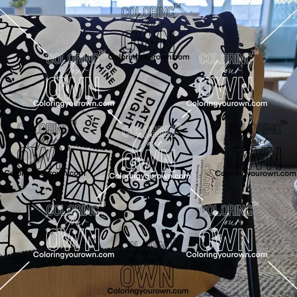 Color Your Own Blanket Valentines day blanket draped over a chair not colored, close up