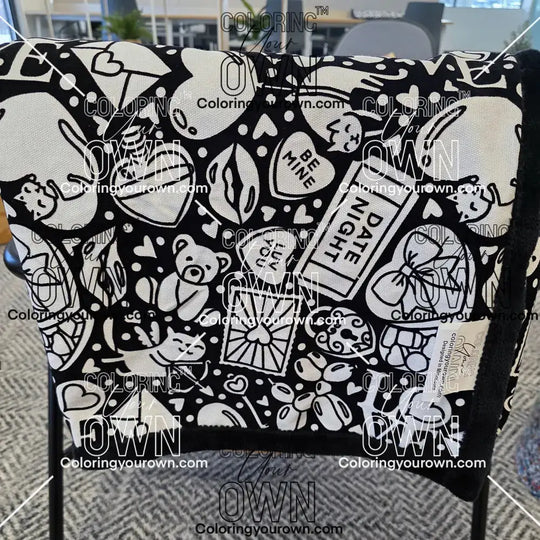 Color Your Own Blanket Valentines day blanket draped over a chair not colored, close up