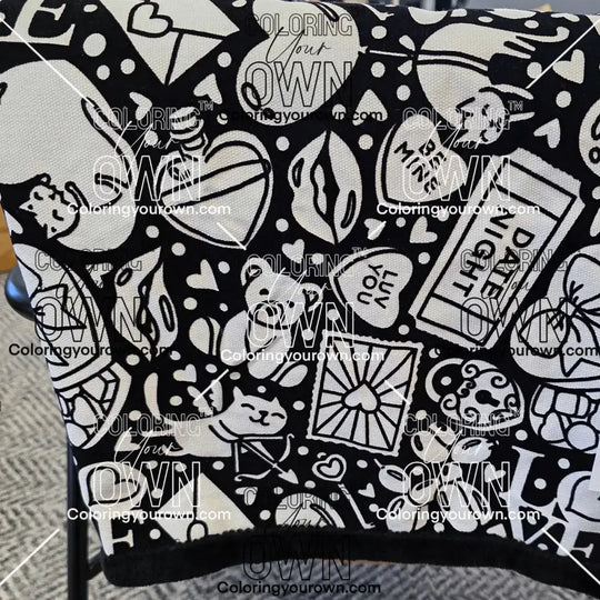 Color Your Own Blanket Valentines day blanket draped over a chair not colored, close up