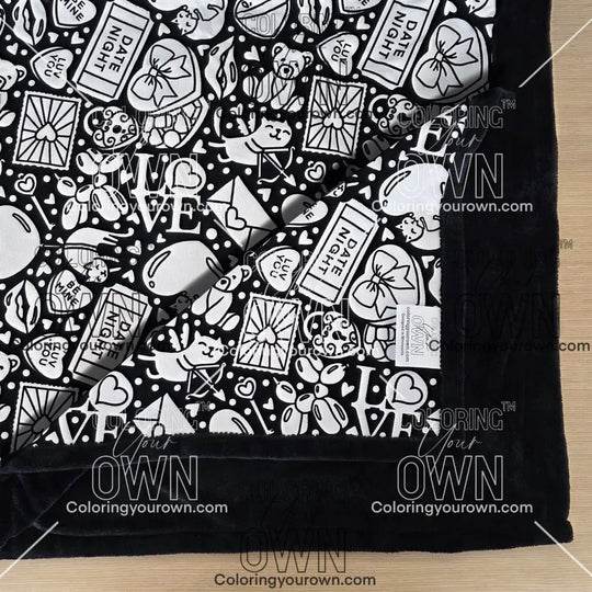 Color Your Own Blanket Valentines day blanket layed out on a table, not colored, close up