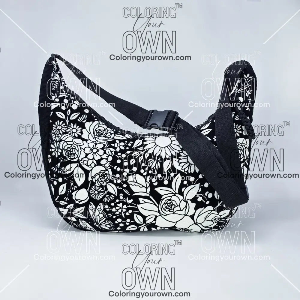 front facing view of the vintage floral coloring crossbody bag partially colored. Black corduroy base with a black strap and quick release buckle. 