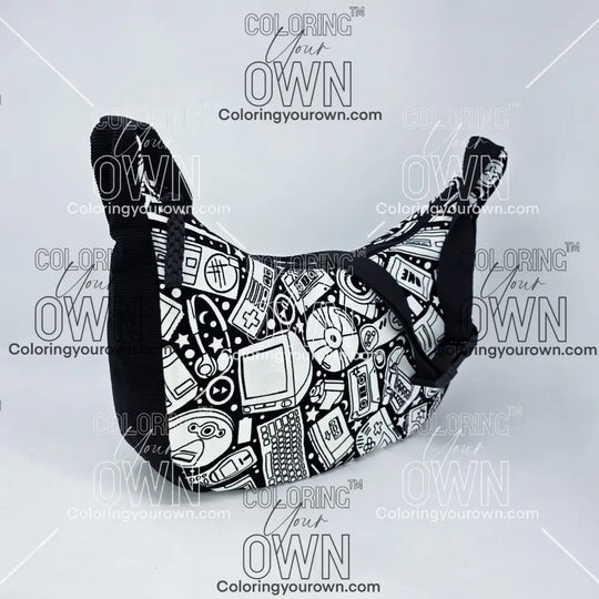three quarter view of the retro tech coloring crossbody bag which features a black strap, black corduroy base, and a buckle quick release.