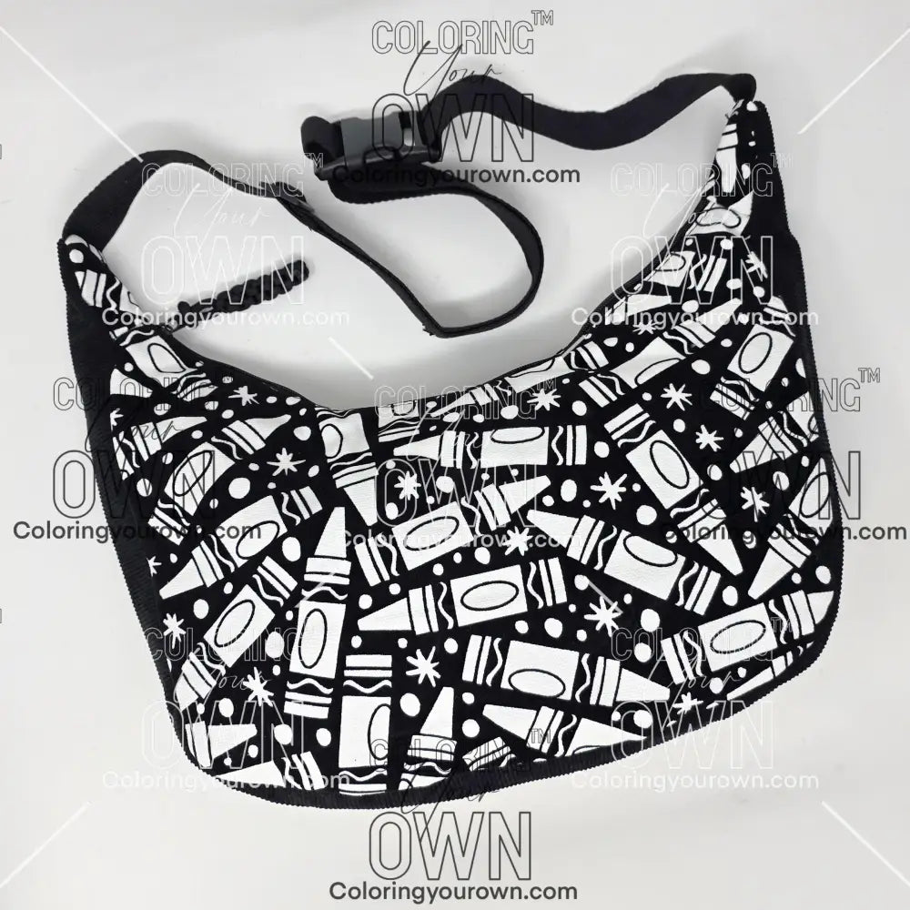 Front view of the crayon coloring crossbody bag which features a black strap, black corduroy base, and a buckle quick release.