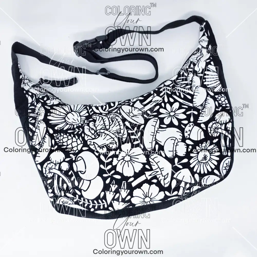 Front view of the mushroom 2 coloring crossbody bag which features a black strap, black corduroy base, and a buckle quick release.