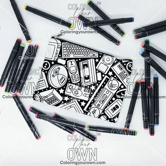 Photo of a black and white flat pencil pouch with lots of colorful markers beside it indicating the customer gets to color it when they receive theirs. This is the same bag as the pencil case and makeup bag - Side B - this bag has images of a disposable camera, boombox, ipod, cd player, keyboard, floppy disk, nokia phone, and more