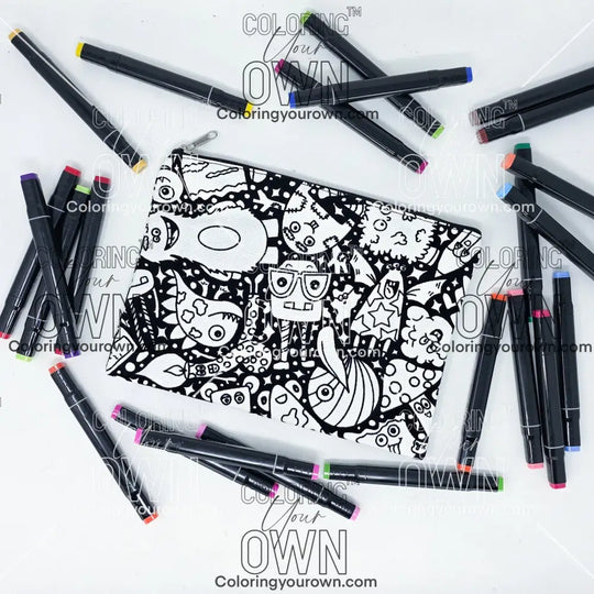 Photo of a black and white flat pencil pouch with lots of colorful markers beside it indicating the customer gets to color it when they receive theirs. This is the same bag as the pencil case and makeup bag - Side B - this bag has images of silly monsters all over