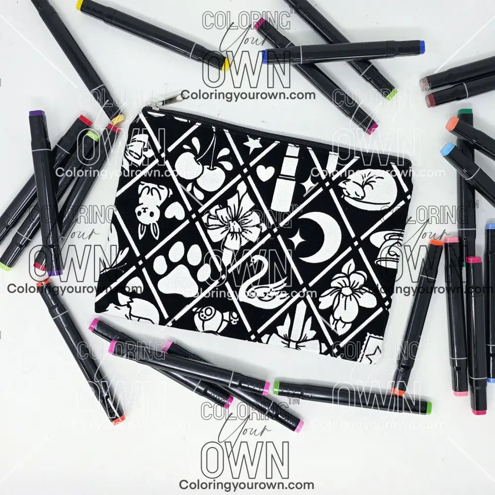 Photo of a black and white flat pencil pouch with lots of colorful markers beside it indicating the customer gets to color it when they receive theirs. This is the same bag as the pencil case and makeup bag - Side B - this bag has images of Coquette-inspired illustrations including a swan, a paw print, bows, a moon, stars, a bunny on it cherries and more