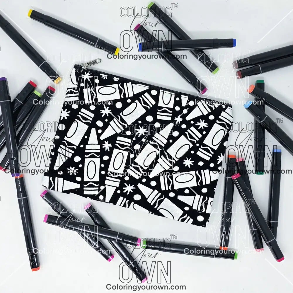 Photo of a black and white flat makeup bag with lots of colorful markers beside it indicating the customer gets to color it when they receive theirs. This is the same bag as the pencil case