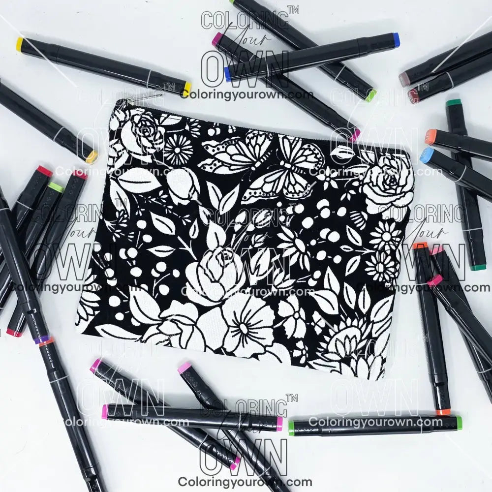 Photo of a black and white flat pencil pouch with lots of colorful markers beside it indicating the customer gets to color it when they receive theirs. This is the same bag as the pencil case - Side A - this bag has images of vintage flowers on it