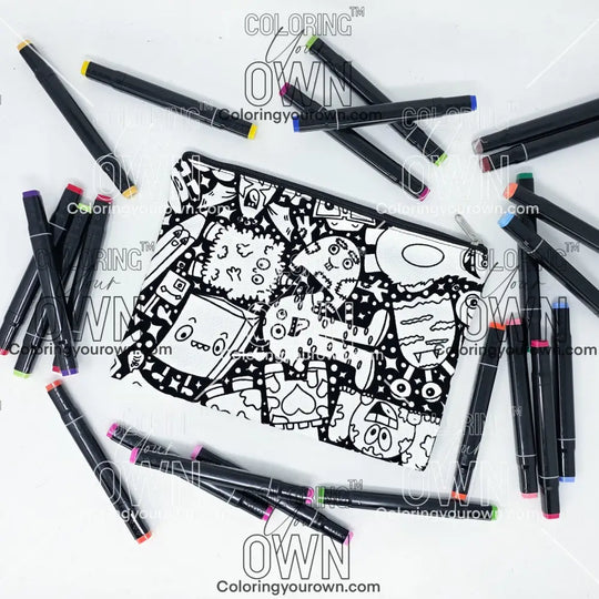 Photo of a black and white flat pencil pouch with lots of colorful markers beside it indicating the customer gets to color it when they receive theirs. This is the same bag as the pencil case and makeup bag - Side A - this bag has images of Coquette-inspired illustrations including a swan, a paw print, bows, a moon, stars, a bunny on it cherries and more