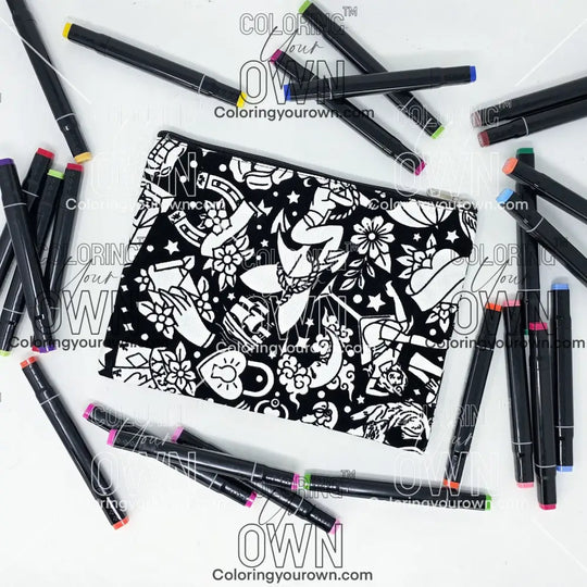 Photo of a black and white flat pencil pouch with lots of colorful markers beside it indicating the customer gets to color it when they receive theirs. This is the same bag as the pencil case and makeup bag - Side A - this bag has images of traditional tattoo-inspired graphics including pinup girls, cigarettes, roses, birds, vampire lips, cards, poison bottles, and more
