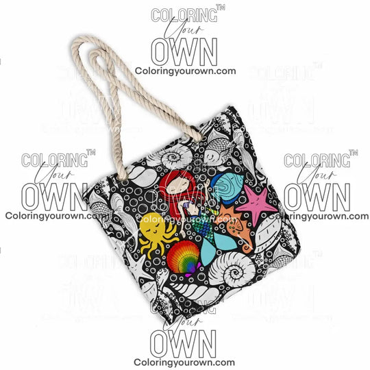photo of a partially colored color your own mermaid tote bag on white background. 