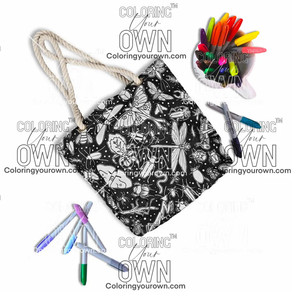 photo of an uncolored color your own bug tote surrounded by markers